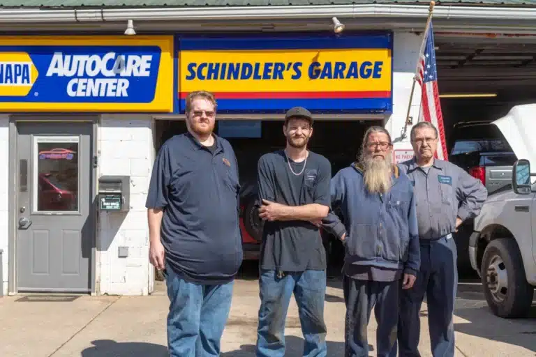 Group photo of the Schindler's Garage team posing together.